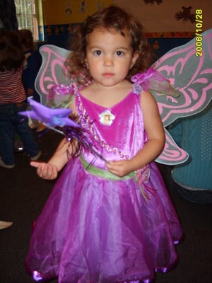 Lisa's little fairy getting ready to trick-or-treat!
