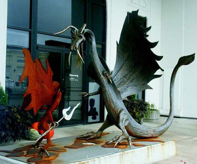 A metal sculpture of a dragon has greeted visitors this week to the downtown branch of Citizens National Bank in Cheboygan. The Moran Iron Works artwork is merely the beginning of the bank’s sixth straight year of decorating its lobby in preparation of today’s Halloween trick-or-treating downtown.
