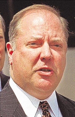 AARON J. WALKER/The Record
C. Scott Vanderhoef, county executive for Rockland County, talks about the beneficial impact increased train frequency will have for rush-hour commuters as Gov. Pataki, left, listens yesterday.
4/20/01