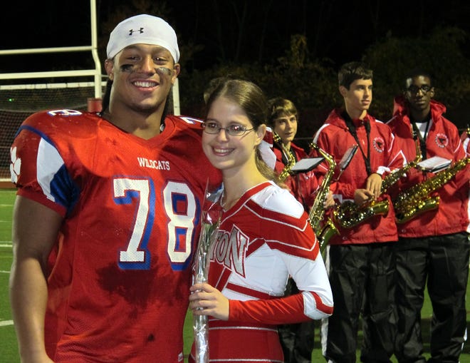 Milton HS recognized their senior football players, band members and cheerleaders at Friday night's home game against Wellesley. 
Senior band members and cheerleaders were presented roses and senior football players presented family members with a rose during the pre-game ceremony.
The final score was Wellesley 37, Milton 16



Photo by Craig Murray/Wicked Local Milton