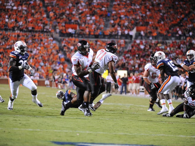 Arkansas State running back Jermaine Robertson runs 13 yards for a touchdown against Auburn on Sept. 4 during their game in Auburn. Robertson, a former Northridge High School standout, missed the past two games after being injured in a car wreck.
