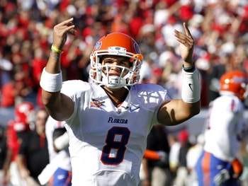Florida's Trey Burton gestures to the crowd before the start of the Florida Georgia football game at EverBank Field in Jacksonville, Fla. Oct. 30, 2010. Florida won 34-31 in overtime.