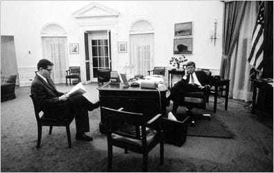 Theodore C. Sorensen with President John F. Kennedy in the Oval Office in 1961.