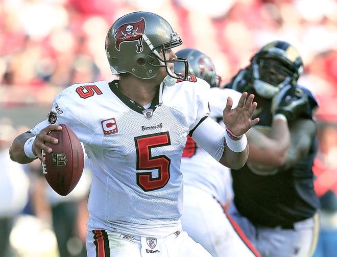 Tampa Bay quarterback Josh Freeman and the Buccaneers are in first place in the NFC South, tied with Atlanta. The Associated Press
