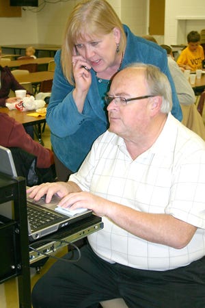 Jim Modert, Bronson superintendent of schools, and his wife, Peggy, checked the Branch County Clerk’s website Tuesday to keeps tabs on returns. The school’s bond request failed by a wide margin.