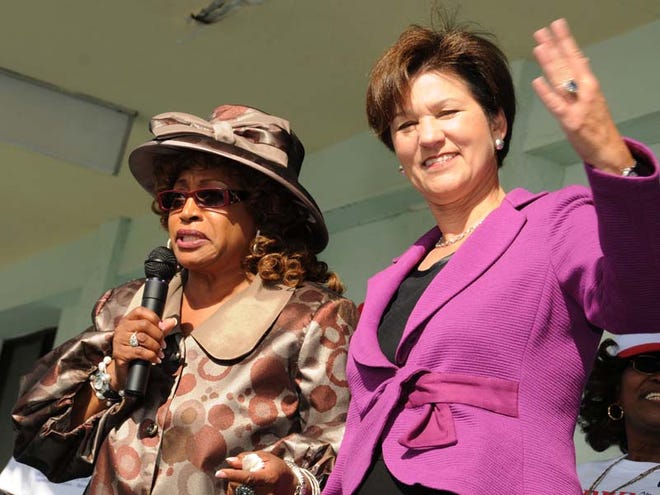 Congress-woman Corrine Brown, left, welcomes Florida guber-natorial candidate Alex Sink to a “Get Out the Vote” rally at Brown’s campaign head-quarters at Gateway Town Center in Jackson-ville. At presstime, Sink trailed Rick Scott by about 70,000 votes, but said she wasn’t giving up. (The Associated Press)