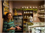 Susan Eisman inside Grateful Meds medical marijuana dispensary in Nederland, Colorado.