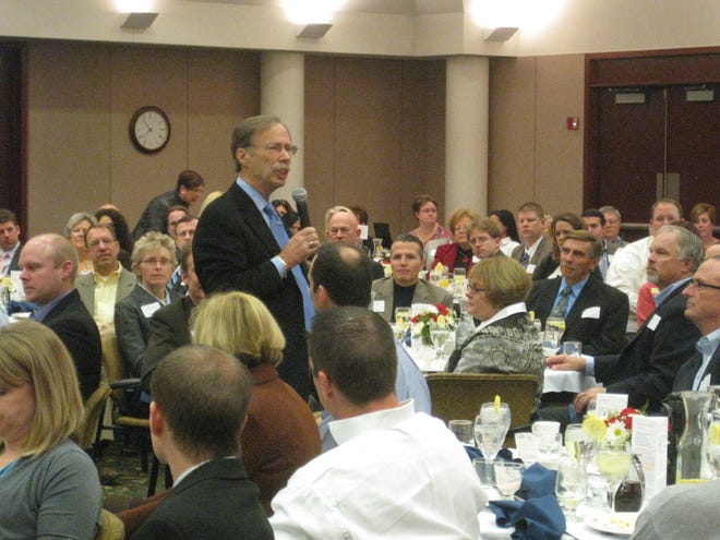 Tim Skubick, anchor of “Off the Record,” interacts with the crowd at a Holland Area Chamber of Commerce breakfast Tuesday at Haworth Inn & Conference Center.