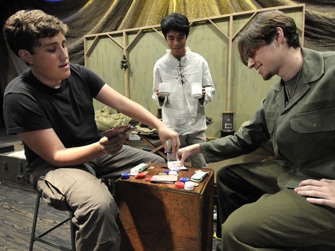 Charlie Sigler, left, as Capt. Walt Waldowski, Brandon Ladia, center, as Ho Jon and Samuel Hunter as Trapper John work through a scene during dress rehearsal for Winter Haven High School's production of "M*A*S*H" on Tuesday. The play opens Thursday at 7:30 p.m. at the high school. Tuesday, Nov. 9, 2010