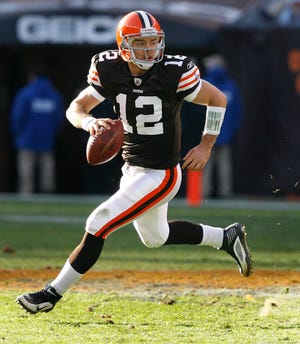 Colt McCoy looks down the field in the Browns game against the Patriots. The Browns beat the Patriots 34-14 on Sunday, November 8, 2010.
