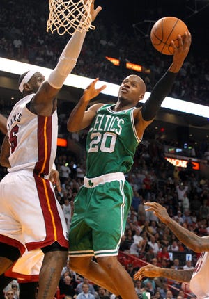 Boston Celtics' Ray Allen goes to the basket against Miami Heat's LeBron James during the third quarter in Miami on Thursday, Nov. 11, 2010. The Celtics won 112-107.