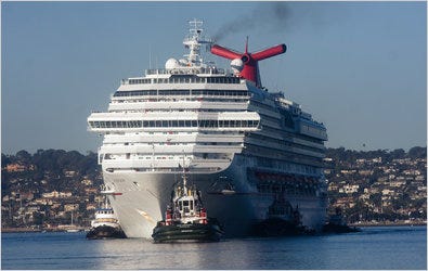 Controlled by four tugboats, the Carnival Splendor entered the harbor in San Diego, Calif.