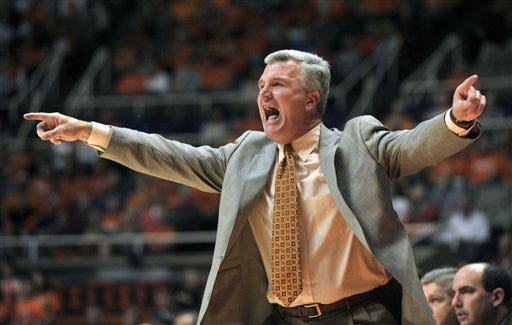 Illinois coach Bruce Weber positions his team's defense against Toledo in the first half of an NCAA college basketball game at Assembly Hall in Champaign, Ill., on Wednesday, Nov. 10, 2010. (AP Photo/John Dixon)