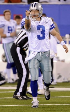 Dallas Cowboys quarterback Jon Kitna (3) points after an interception by New York Giants' Alan Ball during the fourth quarter of an NFL football game at New Meadowlands Stadium Sunday, Nov. 14, 2010, in East Rutherford, N.J. The Cowboys won 33-20. (AP Photo/Bill Kostroun)