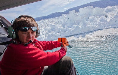 From a helicopter hovering over Greenland, the oceanographer Fiammetta Straneo took measurements to determine how fast the water is melting the nearby Helheim Glacier.