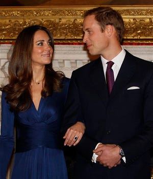 Britain's Prince William and his fiancee Kate Middleton meet the media at St. James's Palace in London after they announced their engagement. The couple are to wed in 2011. ()