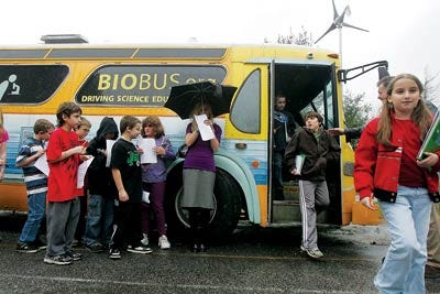 Photo by Daniel Freel/New Jersey Herald - Fifth-grade students from the Wantage Elementary School tour the Cell Motion BioBus in the school’s parking lot Tuesday.