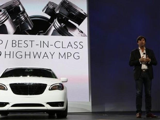 OLIVIER FRANCOIS, president and CEO of Chrysler, Brand Lead Executive Marketing, introduces the 2011 Chrysler 200 at the 2010 Los Angeles Auto Show on Thursday.