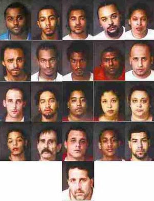 Suspects arrested in a massive drug raid in the Brockton area on Thursday, Nov. 18, 2010.