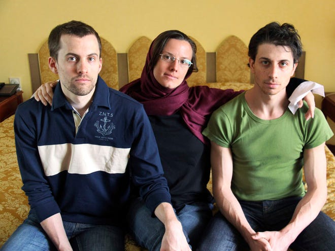 In this May 20, 2010 file photo, American hikers Shane Bauer, left, Sarah Shourd, center, and Josh Fattal, sit at the Esteghlal Hotel in Tehran, Iran. Iran has set a Feb. 6, 2011 trial date for three Americans arrested more than a year ago along the Iraqi border and charged with spying, their lawyer said Sunday, Nov. 21, 2010. (AP Photo/Press TV, File)