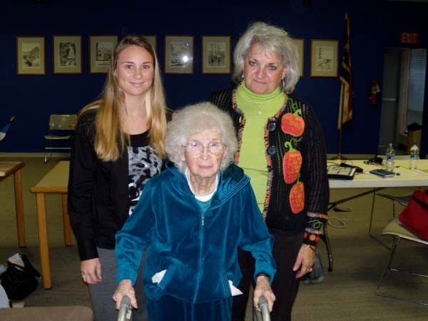 Rosa Mae Hewitt, Veterans Committee chairwoman and chaplain of the Moores Creek Bridge Chapter of the DAR, with her niece, Linda Rivenbark (standing right) and her great-granddaughter, Katie Vernon. (Contributed photo)