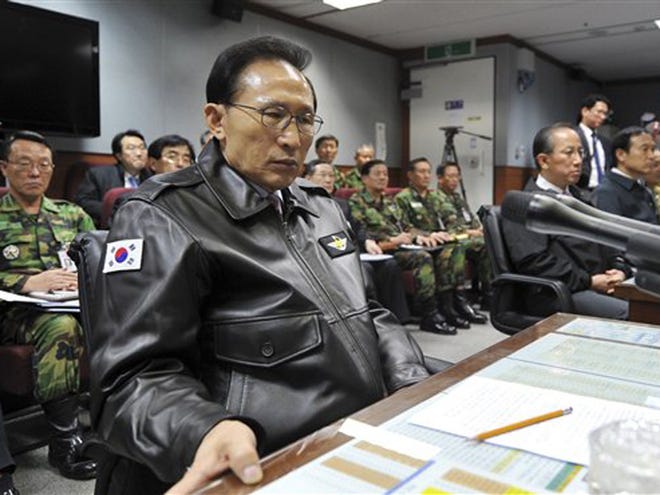 South Korean President Lee Myung-bak has a briefing at the Joint Chiefs of Staff in Seoul as the military was put on top alert after North Korea's artillery attack on a South Korean island of Yeonpyeong Tuesday, Nov. 23, 2010.