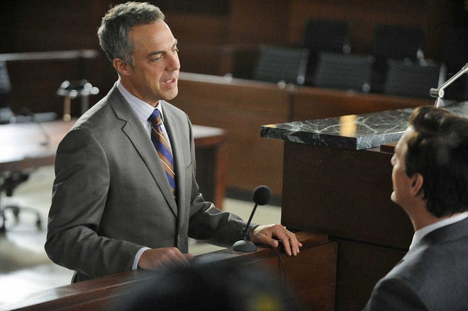 Actor Titus Welliver, left, shown in a scene from the CBS television show “The Good Wife.”