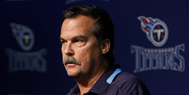 Tennessee head coach Jeff Fisher said talking face-to-face is a 'man thing' after being pressed about QB Vince Young's apology via text.