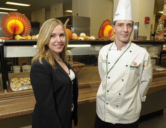 Gisele LeBlanc, a registered dietitian and clinical nutrition manager at UMass Memorial Medical Center — University Campus, and Stephan Naleski, senior executive chef, pause in the University Campus kitchen yesterday.