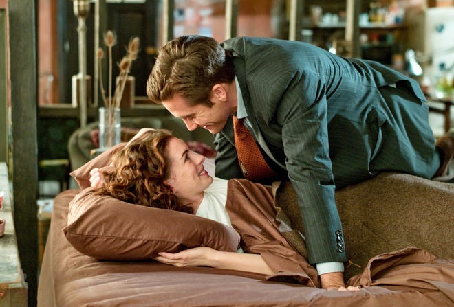 Jake Gyllenhaal, right, and Anne Hathaway are shown in a scene from "Love and Other Drugs."