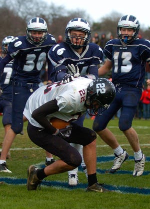 Marblehead junior wide receiver Philip Coughlin hauls in a fourth quarter touchdown pass to cut the Swampscott lead to 21-20 during the annual Thanksgiving Day game against Swampscott on Thursday, Nov. 25. Marblehead tried a two point conversion but failed and lost 21-20.
