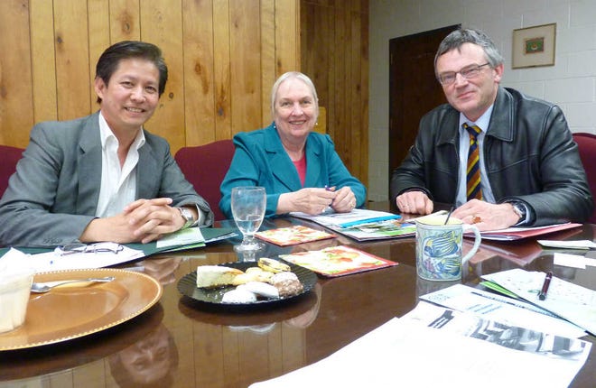 From left, Ge-Yao Liu, director of international education, Shirley Ann Wagner, vice president of academic affairs at Fitchburg State University, and Kurt Kreiten, chairman of the Sister City Committee in Kleve Germany, meet recently at Fitchburg State.