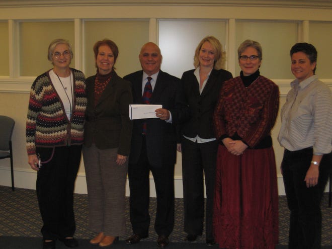 Pictured, from left, are VeAnn Campbell and Noreen Cavanaugh of St. Joseph’s Food Pantry; Peter Copelas, president of Heritage Salem Five Charitable Foundation; Darcey Adams of Northeast Senior Health; Kay O’Rourke of Wellspring House; and Debbie Amaral of the Salem