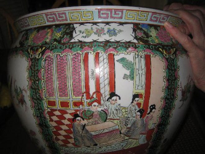 This hand-painted bowl was likely made in Japan after World War II.
