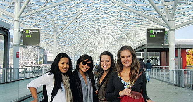 Friends (from left) Lizette Rios, Alice Mac, Ledia Durmishaj and Lindsay Evans pose in the New Trade Fair building by Massimiliano Fuksas on their study abroad trip.