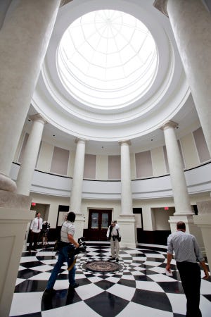 The third floor rotunda of the new courthouse, with patterned terrazzo floors, is modeled on the Michigan Supreme Court's Hall of Justice.