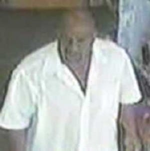 Police are searching for this man, suspected of stealing electronics from a RadioShack.