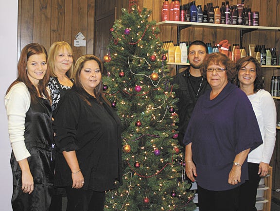 The staff of Midtown Salon and Spa, 212 N. Ladd St., are, from left: Lori Timmerman, Katie Deal, Suzy Rutledge, Rosie Rutledge, Joey Monahan and Lesley Hofbauer Monahan. The Rutledge women are owners of the salon.