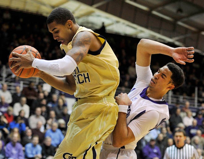 Georgia Tech's Glen Rice Jr. (41) grabs the rebound in front of Northwestern's Drew Crawford during the first half of an NCAA college basketball game Tuesday, Nov. 30, 2010, in Evanston,Il. (AP Photo/Jim Prisching)