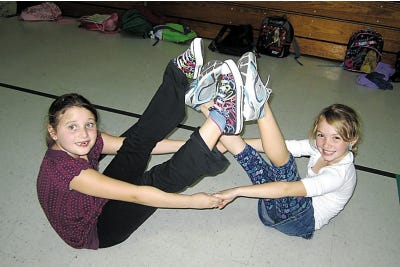 Submitted Photo 
Emily Hendershot and Allie Molfetto paired up for this yoga move.