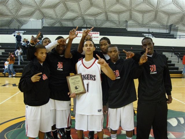 The Donaldsonville Tigers won four games to claim first place in the Gold Dome Classic at St. Amant over the weekend.