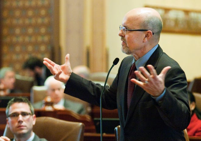 Decorum in the legislature is not usually an issue. Sen. David Koehler, D-Pekin, speaks to attentive colleagues in support of civil union legislation on the floor of the Senate last Wednesday. (AP Photo/Randy Squires)
