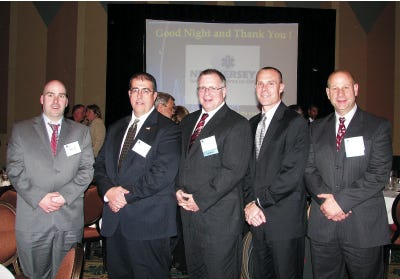 Submitted Photo 
From left are paramedic Armand Cayar, of Wantage; Terrence Hoben, air medical coordinator; paramedic William O’Brien, Carl Corriere’s partner; Daniel Smith, chief flight nurse; and Corriere, flight nurse. Corriere and O’Brien received the EMS Call Award at the 2010 New Jersey Department of Health’s EMS Awards Dinner in Atlantic City last month. The award was for their work with a Fairfield police officer who was shot multiple times on his way to work last winter.