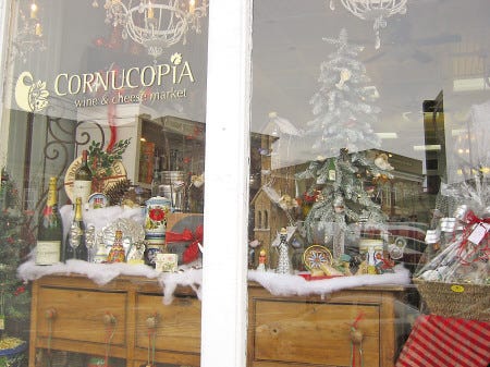 Cornucopia Wine & Cheese Market on Front Street won second place in the window decorating contest as part of the annual Exeter Holiday Open House last Thursday. First place went to Serendipity and third place went to Forever Young.