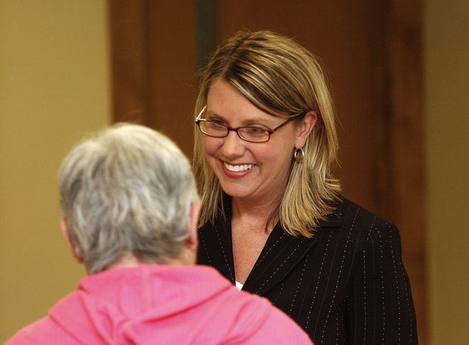 In a 2007 file photo, West Ottawa Superintendent Patricia Koeze meets with teachers and staff during a reception at the administrative offices of West Ottawa schools. The reception gave teachers and school staff an opportunity to meet the Superintendent shortly after she was hired.