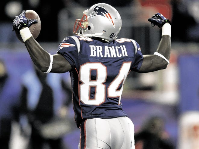 New England Patriots wide receiver Deion Branch (84) celebrates after catching a touchdown pass during the first half of their NFL football game against the New York Jets Monday night, Dec. 6, 2010, in Foxborough, Mass.