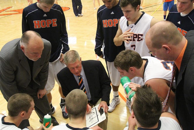 Hope coach Glenn Van Wieren lays out tactics during the Hope vs Calvin basketball game at Devos Fieldhouse Saturday.