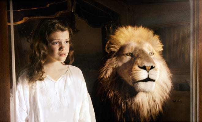 Georgie Henley and Aslan the Lion in "The Chronicles of Narnia: The Voyage of the Dawn Treader."