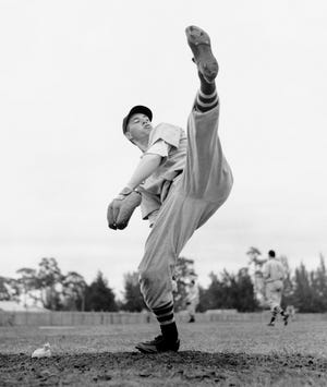 Bob Feller’s signature high kick propelled the Iowa farm boy into the Hall of Fame. Feller died Wednesday, Dec. 15, 2010. He was 92.