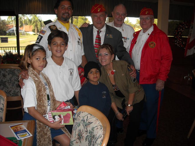 The East Manatee Republican Club honored Tony Rivera, returning veteran who 
was wounded in Afghanistan and is new resident of Bradenton, at its Dec. 9 
luncheon. Rivera and his family, Sheryl, Tony Jr., Nicholas and Jayne, are 
shown with Dave Miner, Clint Miller and Allen Turck. The Toys for Tots 
Luncheon also featured the Honor Guard from the Marine Corps League 
presenting the colors and collecting members' donations of toys to give to 
needy children. The club's next meeting will be at 11:30 a.m. Jan. 13 at at 
the Peridia Golf and Country Club; 4950 Peridia Blvd., Bradenton. The guest 
speaker will be Robert Gause, Manatee County School Board chairman. Peggy 
Simone, the state committeewoman, will install club officers.The cost is 
$15. For reservations, contact Diane Garcia at 739-3813 or 
longboatfl@aol.com.PHOTO PROVIDED BY JOAN SHIREY